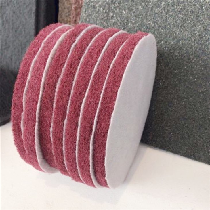 abrasive hand pad